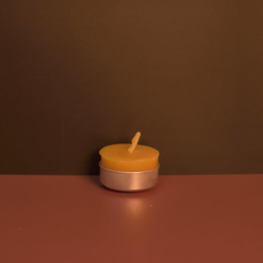 single beeswax tea light candle natural